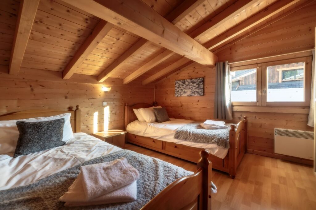 Room 3 Chalet Alba top-floor twin bedroom with shared bathroom