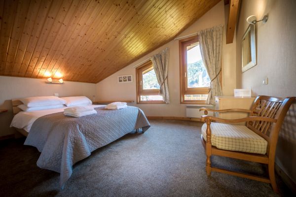 Top floor: Double bedroom. Space for cot. Shared WC with bath and integrated shower.