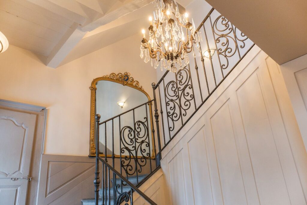 Chandelier staircase Chandelier lit staircase at the Manoir Morzine