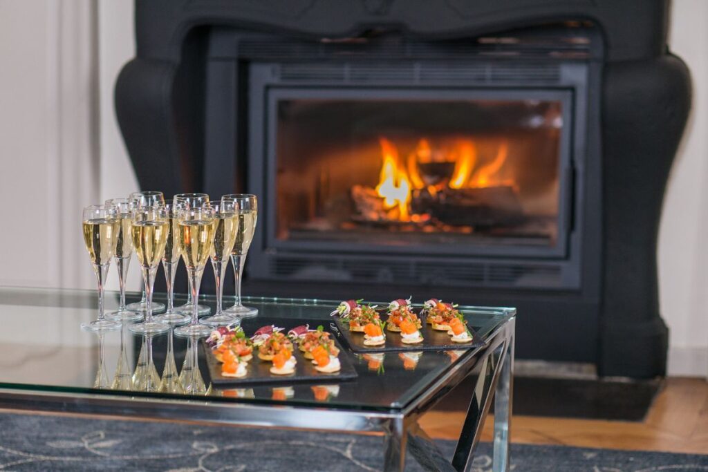 Le Manoir second sitting room Second sitting with room with interconnecting fireplace